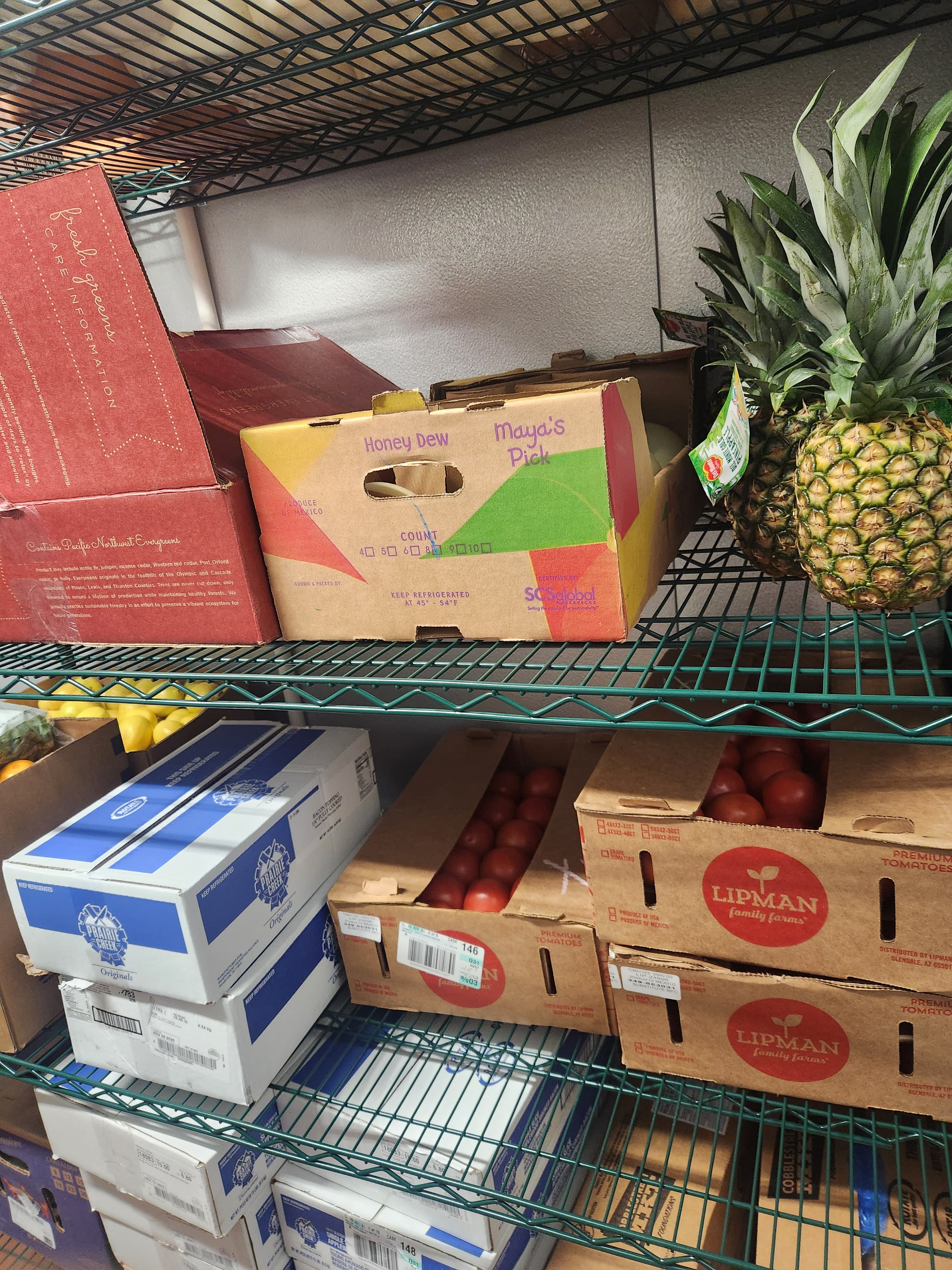 Walk-in shelves restocked with fresh produce at U.S. Egg Tempe